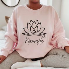 Fall in love with this soft and cozy Namaste Yoga graphic tee or graphic sweatshirt. TO MAKE YOUR SHOPPING EXPERIENCE EASIER THIS LISTING GIVES THE OPTION TO CHOOSE A GRAPHIC T SHIRT or GRAPHIC SWEATSHIRT:) Tee: Short sleeve 100% Cotton Crewneck Sizes: S-5X True to Size Sweatshirt: Long Sleeve Crewneck Soft 50/50 blend S-5X Size up for a slouchy oversized fit Perfect for all seasons Great gift! Yoga Graphic, Distressed Leggings, Yoga Sweatshirt, Fitness Shirt, Namaste Yoga, Womens Hoodies, Yoga Gifts, Tie Dye Sweatshirt, Womens Tie