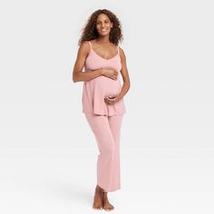 This Drop-Cup Nursing Maternity Pajama Set from Isabel Maternity by Ingrid & Isabel™ prepares your pregnancy wardrobe for the little one's arrival. The two-piece sleepwear set comes with a V-neck tank-top tee and a pair of matching pants — both made from a soft, breathable fabric with spandex in a soft pink hue. The pullover tank has a drop-cup design that makes nursing discreet and simple, while its dainty lace-accented style gives your nightwear a fashionable touch. Maternity Pajama Set, Pink Pajama, Maternity Sleepwear, Nursing Maternity, Maternity Brands, Maternity Pajamas, Women Nurse, Maternity Tank Tops, Matching Mom