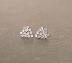 Can make a gorgeous Valentine's day gift..sterling silver cluster earringsunique and minimalist designlight on the earscan go as everyday perfect look and also be fabulous bridal jewelry or other special occasions..measurement:Height 14 mm width 13 mmand golden version:https://www.etsy.com/il-en/listing/200589511/gold-cluster-earrings-small-version?ref=shop_home_active_11also available in a bigger design :https://www.etsy.com/il-en/listing/219537971/streling-silver-cluster-earrings?ref=listing-s Silver Dainty Cluster Earrings For Wedding, Dainty Silver Cluster Earrings For Wedding, Handmade Silver Cluster Earrings For Wedding, Delicate Sterling Silver Cluster Earrings For Wedding, Minimalist Sterling Silver Earrings For Wedding, Silver Minimalist Earrings As A Gift For Her, White Sterling Silver Cluster Earrings For Anniversary, White Sterling Silver Drop Cluster Earrings, Silver Minimalist Earrings For Her