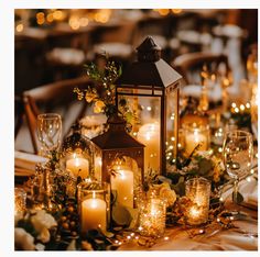 a table topped with lots of lit candles