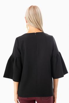 Modern and timeless, the Harper Bell Sleeve Blouse features a flowy silhouette, bell sleeves, and high neckline. Pair with your favorite skinny jeans and heels for a crisp architectural look!

Bell sleeves
Back zipper
Lined
95% polyester, 5% spandex
Care: Machine wash cold, tumble dry low Elegant Party Tops With Pleated Sleeves, Elegant Evening Tops With Gathered Sleeves, Chic Ruffle Hem Blouse For Night Out, Chic Pleated Sleeve Top For Party, Elegant Fitted Blouse With Elastic Sleeves, Pleated Sleeve Tops For Fall Party, Chic Party Top With Pleated Sleeves, Elegant Tops With Gathered Sleeves For Night Out, Fall Party Tops With Pleated Sleeves