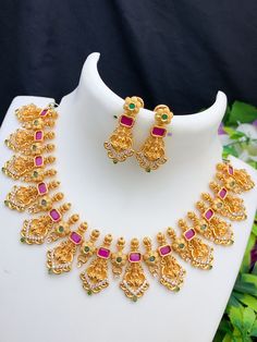 IndianDesigns offer the best collection of South Indian style Lakshmi temple necklace designs online at out Etsy store. You can choose any design as per your choice. Lakshmi Temple, One Gram Gold Necklace, Temple Jewelry, Necklace Design, Cz Jewelry, Wedding Jewellery Necklace, Latest Jewellery, American Diamond, Temple Jewellery