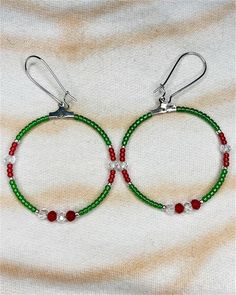 Christmas wreath inspired earrings in a silver 1.5" hoop. Christmas Hoop Earrings, Bead Patterns, Jewelry Earrings Hoops, Christmas Wreath, Beading Patterns, Favorite Jewelry, Hippie Boho, Native American, Christmas Wreaths