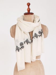 Discover the charm of our Boiled Wool Scarves with Hand Embroidery, expertly crafted in Kashmir. Each piece from this new collection features intricate hand embroidery, designed to add a unique touch to your outfit. These scarves are not only stylish but also make the perfect gift for someone special. *Size : 62 x 190 cm  *Material: 100% Fine Wool.  *Weave: Very Loose Weave. *Thread Count: Low *Feel: Soft Packaging: - *Stylishly wrapped & packed in a strong corrugated box. *Dispatched in a waterproof & tamper-proof bag. Shipping: - *Deliveries outside INDIA : Dispatched within 3 days from India via DHL and takes up to 5-8 business days to deliver, depending on your location. Please message your phone number after placing your order, as it is mandated by DHL for hassle-free deliveries.  *De Hand Embroidery Scarf Designs, Hand Embroidery Scarf, Scarf Designs, Embroidery Scarf, Corrugated Box, Boiled Wool, Pashmina Scarf, Embroidery And Stitching, Wool Scarf