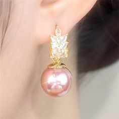 Product Specifications: Pearl Type: ShellPearl Shape: RoundPearl Size:7-8MMPearl Color: PinkStock Number: 7952Metal: 14K Gold plated and ZirconFor: FemaleWeight: 5g Products Include: 1 x Hugetomato Pearl Earrings1 x Box from Huge Tomato Rose Gold Pearl Earrings With Cubic Zirconia, Rose Gold Cubic Zirconia Pearl Earrings, Rose Gold Pearl Round Earrings, Rose Gold Pearl Charm Earrings, Rose Gold Round Pearl Charm Earrings, Gold Cubic Zirconia Round Pearl Earrings, Gold Pearl Earrings With Cubic Zirconia, Rose Gold Single Pearl Earring, Round, Elegant Pink Pearl Earrings For Anniversary