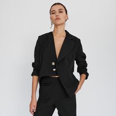 Asymmetry is everything for this black blazer jacket. Asymmetric hem, only one lapel (collar), triangle shape on one side and two different sized buttons,  Defined by its asymmetric details, this comfy chic blazer is tailored to stand out!  It has padded shoulders and boxy shape for structure.  Complete the look with Arya Tapered Pants to suit up! %20 Lyocell %80 Polyester  Dry Clean Only 3d Printing Fashion, Chic Blazer, Blazer Jackets For Women, Comfy Chic, Suit Up, Tapered Pants, Mens Jewelry Bracelet, Triangle Shape, Black Blazer