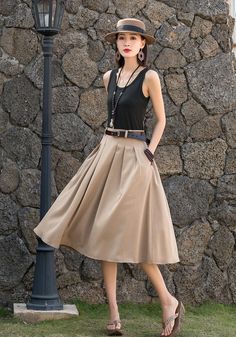 "DETAIL * 50% linen, 50% cotton * No lining * Belt loops * Seam pockets * Right zipper closure * A Line skirt * Wash by hand or machine with cold water * Only three color now * Belt is not sale items * The model is 170cm (5′7″) tall with a 80cm (31.5\") bust, 66cm (26\") waist. She is wearing the Khaki skirt in size XS with csutom length 27\". * Choose CUSTOM Order if you Can't find your size in our size Chart Chang the Length Your Height is not Between 5'1\" - 5\"9\" Your weight is not Between Casual A-line Pleated Skirt For Summer, Casual A-line Pleated Summer Skirt, Spring A-line Pleated Skirt In Solid Color, Spring A-line Solid Pleated Skirt, Spring A-line Pleated Skirt, Summer Workwear Skirt In Solid Color, Solid Color Midi Skirt For Summer, Summer Flared Pleated Skirt In Solid Color, Summer Workwear Skirt Solid Color