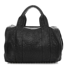 This is an authentic ALEXANDER WANG Pebbled Lambskin Rockie in Black and Nickel Hardware. This stylish bag is crafted of dramatically textured lambskin leather in black. The bag features rolled-leather top handles and nickel hardware including a panel of nickel studs on the base. The top zipper opens to a black fabric interior with zipper and patch pockets. Designer Evening Bags With Grained Texture, Black Evening Bags With Grained Texture, Luxury Black Bags With Grained Texture, Designer Bags With Grained Texture For Everyday Use, Luxury Top Handle Bag With Pebbled Texture, Leather Shoulder Bag With Pebbled Texture And Top Handle, Leather Top Handle Shoulder Bag With Pebbled Texture, Elegant Black Shoulder Bag With Grained Texture, Luxury Rectangular Bag With Pebbled Texture