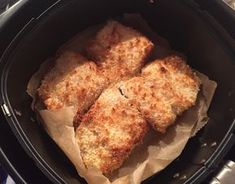 four pieces of fried meat in a crock pot