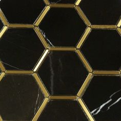 black and gold hexagonal tile with golden accents