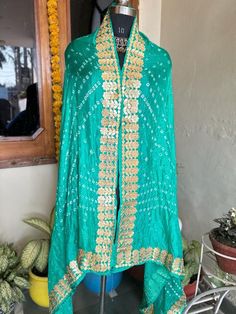 *Women ethnic motifs Gotta pati work Dupatta . *Rama green color  *Four sided lace border. Material:silk  Length:2.9 Width:39 Hand wash Bohemian Semi-stitched Raw Silk Traditional Wear, Green Embroidered Bohemian Shawl, Bohemian Semi-stitched Traditional Wear With Bandhani Print, Bohemian Traditional Wear With Bandhani Print, Semi-stitched, Green Dupatta For Navratri Festival, Bohemian Traditional Wear With Bandhani Print, Green Unstitched Traditional Wear With Zari Work, Green Semi-stitched Embroidered Dupatta, Green Traditional Wear With Zari Work