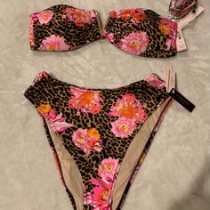 Brand New With Tags Leopard & Floral Print Victoria Secret Bikini. Bandeau Top Has Gold V Hardware & Optional Strap . Bottoms Are High Waisted With High Cut Sides. Super Sexy ! Victoria's Secret Floral Print Swimwear For Beach Season, Victoria's Secret Bandeau Swimwear For Vacation, Victoria's Secret Floral Beachwear Swimwear, Victoria's Secret Floral Print Beachwear, Victoria's Secret Floral Print Summer Swimwear, Halter Swim Top, Tankini Swimsuit Top, Bandeau Top, High Cut