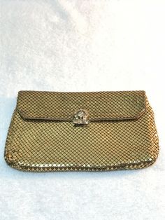 Whiting and Davis gold mesh clutch purse evening bag, rhinestone clasp, c. 1950s. Vintage and in excellent condition!! Ships fast and free :) Whiting And Davis Mesh Purses, Mid-century Gold Evening Bag, Retro Gold Evening Bag, Vintage Rectangular Clutch For Events, Antique Clutch Evening Bag For Party, Gold Rectangular Clutch For Cocktail, Gold Rectangular Cocktail Clutch, Retro Gold Evening Bag For Parties, Gold Clutch Evening Bag For Cocktail