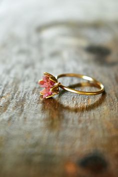 Unique raw Ruby ring in 14K yellow gold fill. My bestselling lotus ring design, now in yellow gold or fill! A handcrafted 14K gold fill band with my etched cup filled with raw Ruby chips in a mosaic pattern, my signature design. Organic, natural ruby reds in varying shades look pretty and unique next to the yellow gold color. Ruby is July's birthstone. Made to order, to size. Scroll to read all the details. I love this ring as sparkly, any occasion present for her, Women's July birthstone gift f Delicate Gold Flower Ring With Gemstone, Yellow Gold Flower Ring With Gemstone For Weddings, Gold Flower-shaped Rings With Gemstones, Gold Flower Ring With Birthstone For Wedding, Flower Shaped Ruby Ring In Yellow Gold For Wedding, Untreated Gold Rings For Wedding, Flower-shaped Yellow Gold Ruby Ring For Wedding, Yellow Gold Ruby Ring For Wedding With Flower Shape, Yellow Gold Flower Ruby Ring For Wedding