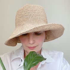 Our wide brim raffia hat crochet of paper rope yarn. It`s natural fiber - cellulose Floppy bucket hat is soft, but sturdy, flexible, light weighted, foldable and washable! Trendy sun hat is a great handmade gift for women any age. more crochet bucket hat here https://etsy.me/3GyieCJ our colorful crochet bags here https://etsy.me/3mXZ93a Main photo shows straw yellow floppy hat Sizes: 6⅞, 7, 7⅛ US, (XS, S, M) for head circumference 22`` (55-57 cm) 7¼, 7⅜ US, (L, XL) for head circumference 23`` (58-59 cm) XXL for big head (60-61 cm) CARE: hand washable in water 40 C. Dry flat. Special designs can be created by combining different colors according to the customer's specifications. Custom orders are welcome! Crochet summer panama produced and packed in non-smoking, pet free studio. Real item c Natural Wide Brim Toquilla Straw Bucket Hat, Handwoven Beige Brimmed Bucket Hat, Natural Toquilla Straw Bucket Hat For Spring, Beige Toquilla Straw Bucket Hat With Flat Brim, Natural Handwoven Bucket Hat With Curved Brim, Lightweight Natural Bucket Hat For Spring, Beige Wide Brim Handwoven Bucket Hat, Casual Natural Brimmed Bucket Hat, Beige Handwoven Wide Brim Bucket Hat