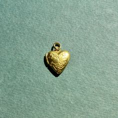 This small heart locket is approximately ~0.5 inches in size. The charm is made of raw brass and comes with a jump ring for threading on your favorite necklace or jewelry making. Vintage Locket, Vintage Lockets, Floral Heart, Locket Charms, Vintage Heart, Heart Locket, Small Pendant, Small Heart, Threading