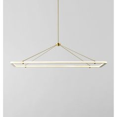 a modern light fixture hanging from the ceiling