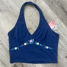 Lightweight Blue Cropped Halter Top With Floral Embroidered Detail. Size Medium Cropped Halter Top, Tie Dye Crop Top, Yellow Ties, Crochet Halter Tops, Halter Crop Top, Levi Jeans 501, White Tie, Distressed Black Jeans, Polo Dress