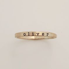 Add a touch of individuality to your jewelry collection with the Typewriter Name Ring from Going Golden. Handcrafted in Brownsburg, Indiana, this ring is perfect for those who love a classic, typewriter-style font. Available in 14K gold-filled, fine silver, or rose gold, this ring offers 100x more solid gold than plated alternatives, ensuring it’s waterproof and tarnish-resistant. Each ring comes with a polishing pad and a gift box, making it a thoughtful gift for someone special or a delightful Everyday Gold Hand Stamped Stackable Rings, Hand Stamped 14k Gold Engraved Ring, Hand Stamped 14k Gold Ring, Hand Stamped 14k Yellow Gold Engraved Ring, 14k Yellow Gold Hand Stamped Engraved Ring, 14k Yellow Gold Engraved Ring With Hand Stamped Details, Gold Engraved Tarnish-resistant Sterling Silver Ring, Classic Rose Gold Engraved Stackable Ring, Adjustable 14k Gold Hand-stamped Rings