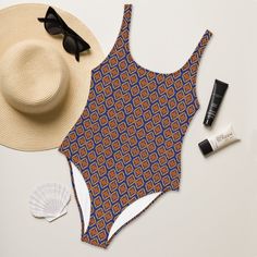 Urban African Print Bathing Suits – a bold fusion of style and culture. These swimsuits aren't just beachwear; they're a statement! Picture yourself strutting poolside or catching waves in designs that reflect you. African Print, The Struts, One Piece Swimsuit, Bathing Suits, One Piece, Design