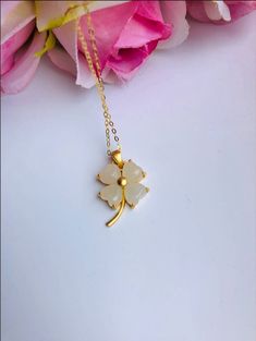 A piece of charming & cute white jade necklace, which is made with genuine 100% natural real white jades and 14k gold plated necklace. A great combination of modernness and elegance. The simple and lovely lucky clover design adds a spark to your daily wear or a bit of charm for your fun dating night. Perfect as a gift for your loved ones or yourself, and to wish them GOOD LUCK! Some Highlights of this piece 18'' white lucky Chinese jade pendants are: ＊High-quality Material Only 100% natural Elegant White Jade Jewelry, Delicate White Necklace For Gift, Elegant White Jewelry For Good Luck, White Flower Pendant Jewelry Gift For Her, Handmade White Jade Necklaces, White Jade Jewelry For Wedding, White Pendant Necklace For Good Luck, White Clavicle Chain Jewelry Gift For Her, White Clavicle Chain Jewelry As Gift For Her