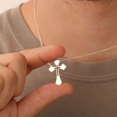 This elegant silver cross necklace is the perfect way to display your faith in a stylish and meaningful way. Crafted with care, this religious pendant makes a thoughtful gift for special occasions like Christmas or birthdays ✝️🎁. High-quality silver cross pendant A beautiful symbol of faith and spirituality Ideal for men seeking a minimalist yet meaningful design Perfect as a birthday or Christmas gift for him 🎄 Lightweight and comfortable for everyday wear Adjustable chain for a personalized Silver Necklace For Men, Meaningful Design, Faith Necklace, Beautiful Symbols, Unique Gifts For Him, Mens Silver Necklace, Silver Cross Pendant, Christmas Gifts For Him, Christian Cross