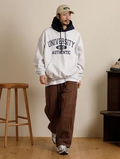 This is a casual and refined hoodie that is made out of high quality cotton and polyester blend fabric. With design detail of graphic print on the chest and oversized silhouette, it gives a trendy and casual mood.- Oversized silhouette- Kangaroo pocket and ribbed hem and cuff- Graphic print on the front chest Long Sleeve Cotton Hoodie For College, College Long Sleeve Cotton Hoodie, Cotton Long Sleeve Hoodie For College, Varsity Style Relaxed Fit Hoodie For Streetwear, Baggy Cotton Hoodie With Ribbed Cuffs, Oversized Hoodie Sweatshirt For College, Varsity Hoodie With Graphic Print For Winter, Winter Varsity Hoodie With Graphic Print, Urban Cotton Hoodie For College