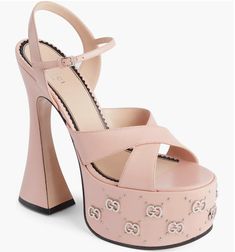 The GG-logo pattern is rendered in polished metal letters and studs at the chunky platform of this quarter-strap sandal lifted by a striking spool heel. Luxe Swimwear, Luxe Clothing, Black Chunky Heels, Holiday Glam, Spool Heel, Gg Logo, Metal Letters, Perfect Pink, Logo Pattern