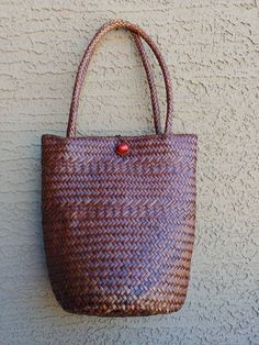 Fabulous naturally dyed colored  basket which is a timeless and popular.  The measures: H.- 10" W - 6.5"  Handles drop 8" This is a great green alternative to any shopping bags. Organic and beautiful. The basket is in good condition. More organic fiber items: https://www.etsy.com/listing/292919221/asian-bamboo-steamer-with-lid-10-inches?ref=shop_home_active_18 https://www.etsy.com/listing/472271566/natural-fiber-rectangular-curved?ref=shop_home_active_10 https://www.etsy.com/listing/288201951/vintage-rustic-curvy-wine-rack-wood?ga_search_query=fiber&ref=shop_items_search_5 https://www.etsy.com/listing/472920442/organic-wool-blanket-undyed-white?ga_search_query=fiber&ref=shop_items_search_1 Thank you very much for your interest and support! Cheers, Natasha Brown Basket, Summer Handbag, Brown Baskets, Over The Shoulder Bag, Summer Handbags, Over The Shoulder Bags, Naturally Dyed, Market Bag, Shopping Tote