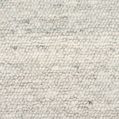 the texture of an upholstered carpet is white