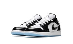 The Air Jordan 1 Low SE GS “Concord” is the youth sizing of the popular low-top sneaker that draws inspiration from the Air Jordan 11’s original colorway.  Based on the iconic “Concord” Jordan 11, the Jordan 1 Low SE GS features a white leather base with contrasting black patent leather overlays and Swoosh branding.  White “Wings” detailing is embroidered on the back of the shoe.  A black Jumpman is found on the white nylon tongue.  Underfoot, the icy blue translucent outsole is a nod to the des Concord Jordan 11, Nike Air Jordan Low, Swag Clothes, Nike Jordan 1 Low, Air Jordan Low, Jordan Shoes For Women, Shoes Streetwear, Jordan Low, Sneakers Jordan