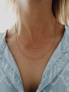 "This is a beautiful and classic double chain necklace. It features two strands of beaded 14/20 gold-fill chains. This necklace is perfect for layering or can be worn alone as it is shown here. Pictured: Gold, 18\" and 20\" Matching Bracelets: https://www.etsy.com/listing/240619436/double-strand-gold-beaded-chain-bracelet?ref=shop_home_active_2 https://www.etsy.com/listing/240617990/gold-beaded-chain-bracelet-in-1420-gold?ref=shop_home_active_7" Beaded Chain Necklace, Double Chain Necklace, Double Chain, Matching Bracelets, Gold Filled Chain, Gold Beads, Beaded Chain, Chain Bracelet, Gold Filled