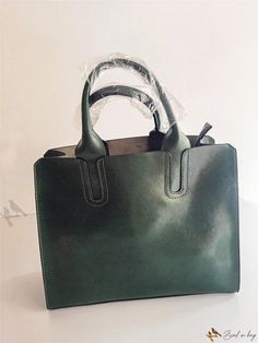 Bird in Bag - Womens Classic Faux Leather Tote Handbag - Versatile Shoulder Bag with Long Strap - Perfect for Party, Shopping, and Everyday Use - Stylish Green Design Green Top Handle Box Bag With Large Capacity, Faux Leather Satchel Box Bag For Office, Green Top Handle Satchel With Large Capacity, Green Large Capacity Top Handle Box Bag, Trendy Faux Leather Box Bag For Office, Green Tote Shoulder Bag For Office, Green Large Capacity Box Shoulder Bag, Green Box Bag With Large Capacity And Double Handle, Green Shoulder Bag For Office