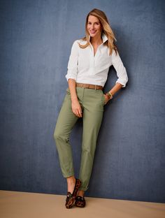 Heaven-on-earth softness. And that little roll at the hem? Perfection. Features Flat Front/Trouser Relaxed Leg Hits Below Waist Ankle Length Fly front with button closure Front Slash, Back welt pockets Imported Fit: Inseam: Rolled: Misses 27"; Petite 24 1/2"; Plus 27"; Plus Petite 24 1/2" Unrolled: Misses 29 1/2"; Petite 27"; Plus 29 1/2"; Plus Petite 27" Material: 98% Cotton, 2% Spandex Care: Machine wash; tumble dry | Relaxed Chinos Pants Talbots Business Casual Capsule Wardrobe, Simple Capsule Wardrobe, Best Work Pants, Green Chinos, Capsule Wardrobe Essentials, Tan Legs, Chinos Style, Perfect Pant, Classic Style Women