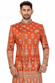 Product Features: Top Color: Rust Orange Bottom Color: Gold Work: Embroidery Top Fabric: Art Silk Bottom Fabric: Art Silk Pack Of: 1 Sherwani and Aligarh Pant Occasion: Partywear Disclaimer: There will be slight difference in digital to actual image