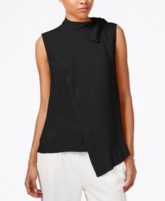 Rachel Rachel Roy Mock Neck Asymmetrical Top Modern Asymmetrical Solid Color Tops, Black Asymmetrical Top For Work, Solid Asymmetrical Hem Top For Work, Black Asymmetrical Hem Top For Work, Modern Asymmetrical Hem Top For Fall, Modern Tops With Asymmetrical Hem For Workwear, Modern Asymmetrical Hem Top For Work, Elegant Black Asymmetrical Top, Versatile Asymmetrical Black Top