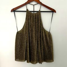 New Never Worn Crimped Gold Black Halter Top Chic Shiny Tops For Party Season, Spring Party Tops With Shine Detail, Chic Glitter Tops For Festive Occasions, Chic Glitter Top For Festive Occasions, Chic Shiny Tops For Night Out, Chic Tops With Shine For Night Out, Chic Metallic Tops For Party Season, Trendy Shimmer Tops For Party, Shiny Evening Top For Spring