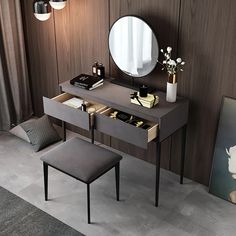 a dressing table with stool and mirror in a room