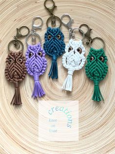 six owl keychains with tassels are shown in different colors and sizes