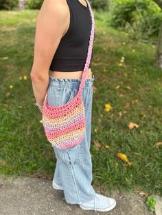 These cute and practical crocheted cross-body bags are perfect for carrying essentials on the go. You can carry your phone, wallet, gum, some spare cash, etc. These bags also make perfect gifts for anyone from your daughter, to your best friend, or even your mom who wants to have some fun with a bright, colorful, and practical accessory! This stylish bag measures about 9 inches tall and 9.5 inches wide with a strap that measures about 38 inches long and 1.5 inches wide. Cute Everyday Pouch Phone Bag, Cute Pouch Phone Bag, Casual Multicolor Shoulder Phone Bag, Casual Crochet Pouch Bag For Everyday Use, Casual Crochet Pouch Bag, Casual Pink Phone Bag With Cell Phone Pocket, Casual Pink Shoulder Bag As Gift, Casual Pink Shoulder Bag Perfect For Gift, Casual Pink Shoulder Bag For Gift