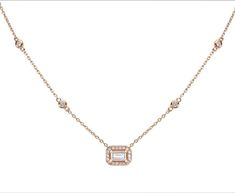 Add a touch of timeless elegance to your collection with this stunning 14K gold necklace, featuring a brilliant 0.30 carat emerald-cut lab diamond as the centerpiece. Encased in a dazzling halo of 0.19 carats of natural diamonds, this necklace beautifully merges modern sustainability with classic luxury. The fine gold chain is accented with additional bezel-set diamonds, adding an extra sparkle to this already captivating piece. Perfect for those who appreciate refined beauty and sustainable craftsmanship, this necklace is ideal for special occasions or elevating your everyday look. Material: 14K Solid Gold Center Stone: 0.30 carat lab-created emerald-cut diamond Accent Diamonds: 0.19 carat natural, conflict-free diamonds Design: Halo setting with additional bezel-set diamonds on the chain Lab Created Emerald, Halo Setting, Bezel Set Diamond, 14k Gold Necklace, Emerald Cut Diamonds, Diamond Design, Diamond Halo, Conflict Free Diamonds, Lab Diamonds