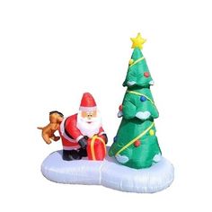 an inflatable christmas tree with santa and his dog