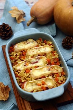 a casserole dish with meat and vegetables in it