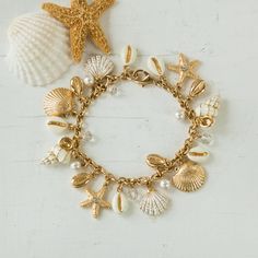 Swarovski Crystal Coastal Charm Bracelet | Uno Alla Volta Surf Jewelry, Preppy Jewelry, Pretty Jewelry Necklaces, Jewelry Accessories Ideas, Dope Jewelry, Jewelry Fashion Trends, Jewelry Essentials, Jewelry Lookbook, Fancy Jewelry