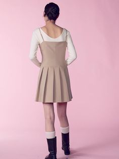 This is a sleeveless mini dress with an attractive minimalist vibe. The light length and cut lines on the body create a slim body line, and the pleated details on the skirt add a casual yet feminine mood.- You can adjust the length of the shoulder straps to fit your body shape.- Open and close with side zipper- Can be worn alone or layered with innerwear such as a T-shirt*The color of the product may differ from the actual color depending on the monitor resolution. Spring A-line Mini Dress With Pleated Back, Spring Mini Pleated Dress With Pleated Back, Feminine Mini Dress With Pleated Waist, Mini Dress With Pleated Back, Spring Mini Dress With Pleated Back, Chic Mini Length Pleated Dress, Chic Mini Dress With Pleated Back, Date Night Mini Dress With Pleated Back, Pleated Sleeveless Mini Dress For Spring