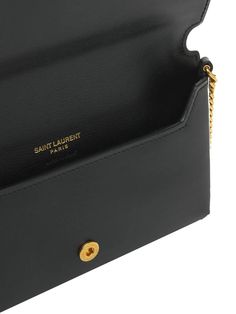 Height: 11cm Width: 18cm Depth: 2.5cm. Shoulder strap drop: 50cm. Fixed metal chain strap with leather insert . Front flap with snap button closure. Front metal logo. One back pocket Saint Laurent Bags, Monogrammed Leather, Saint Laurent Bag, Metal Logo, Metallic Logo, Personal Shopping, Women's Bags, Metal Chain, Kate Spade Crossbody