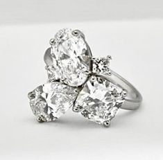 THE DOLORES---3-STONE/CLUSTER RING IN PLATINUM 3.13 F VS2 IGI Certified Cushion Cut Lab Grown Diamond 2.76 F VS1 IGI Certified Oval Cut Lab Grown Diamond 2.40 F VS1 IGI Certified Pear Cut Lab Grown Diamond Platinum Setting with two Lab Grown 0.15ct. Princess Cut Diamonds Band width: 2mm Total: $14.049 +tax ---------------------------------------------- -Jewelry Orders are Final, No Returns or Exchanges -Shipping and Import Fees are at No Cost to USA/Canada Buyers -Customer is Responsible for Sep Platinum Multi-stone Cluster Diamond Ring, Platinum Cluster Multi-stone Diamond Ring, Diamond White Multi-stone Oval Diamond Ring, Oval Multi-stone Diamond White Diamond Ring, Oval Multi-stone Diamond Ring In Diamond White, Platinum Multi-stone Cluster Ring, Platinum Multi-stone Diamond Wedding Ring, Dazzling Oval Multi-stone Cluster Ring, White Cluster Multi-stone Diamond Ring