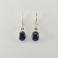 This is a  beautiful pair of Blue Kyanite Earrings in 925 Sterling Silver. They are made out of Sterling Silver with no nickel so there should be no allergic reaction and nothing will turn green. The silver is not only silver plated or steel but solid 925 Sterling Silver. We usually ship the same day in a nice gift box. Elegant Blue Oval Cabochon Earrings, Blue Polished Drop Earrings, Blue Drop Earrings With Polished Finish, Blue Oval Hallmarked Earrings, Classic Oval Sterling Silver Earrings, Oval Sapphire Earrings Hallmarked, Oval Sterling Silver Earrings With Polished Finish, Everyday Sapphire Sterling Silver Jewelry, Blue Oval Cabochon Earrings As Gift