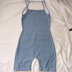 Jumpsuit Romper Pretty Blue Color Size Medium Never Worn Open Back Blue Sleeveless Cotton Bodysuit, Blue Stretch Overall Jumpsuits And Rompers, Blue Cotton Bodysuit For Loungewear, Summer Loungewear Overall Bodysuit, Blue Casual One-piece Jumpsuits And Rompers, Casual Blue Cotton Bodysuit, Blue Stretch Cotton Bodysuit, Casual Light Blue Sleeveless Bodysuit, Blue Cotton Bodysuit For The Beach