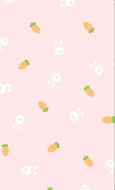 a pink background with rabbits and carrots on it